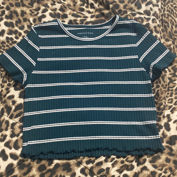 this is a very cute cropped green, striped American eagle shirt. - Picture 1 of 4
